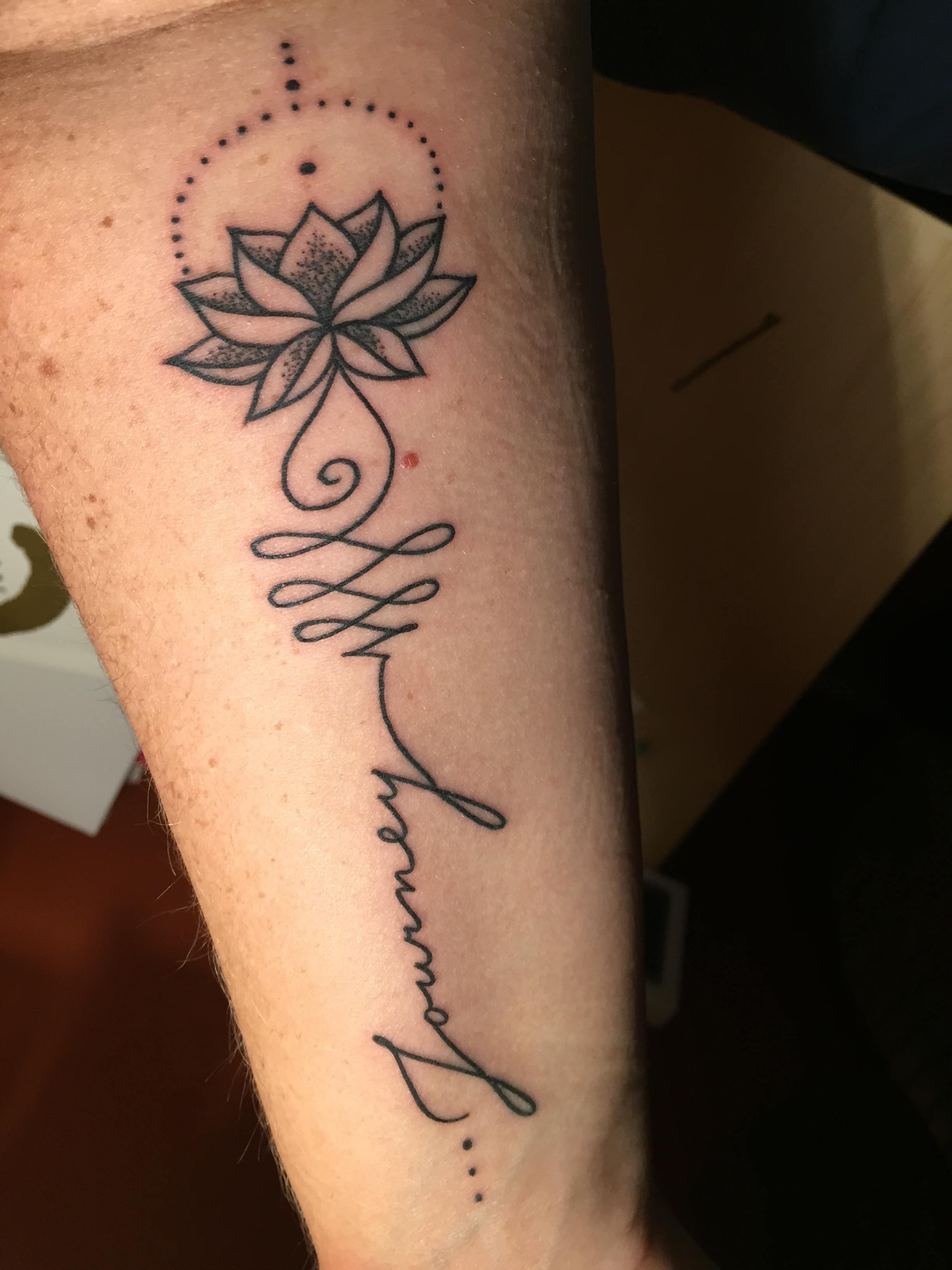 Lotus and journye tattoo