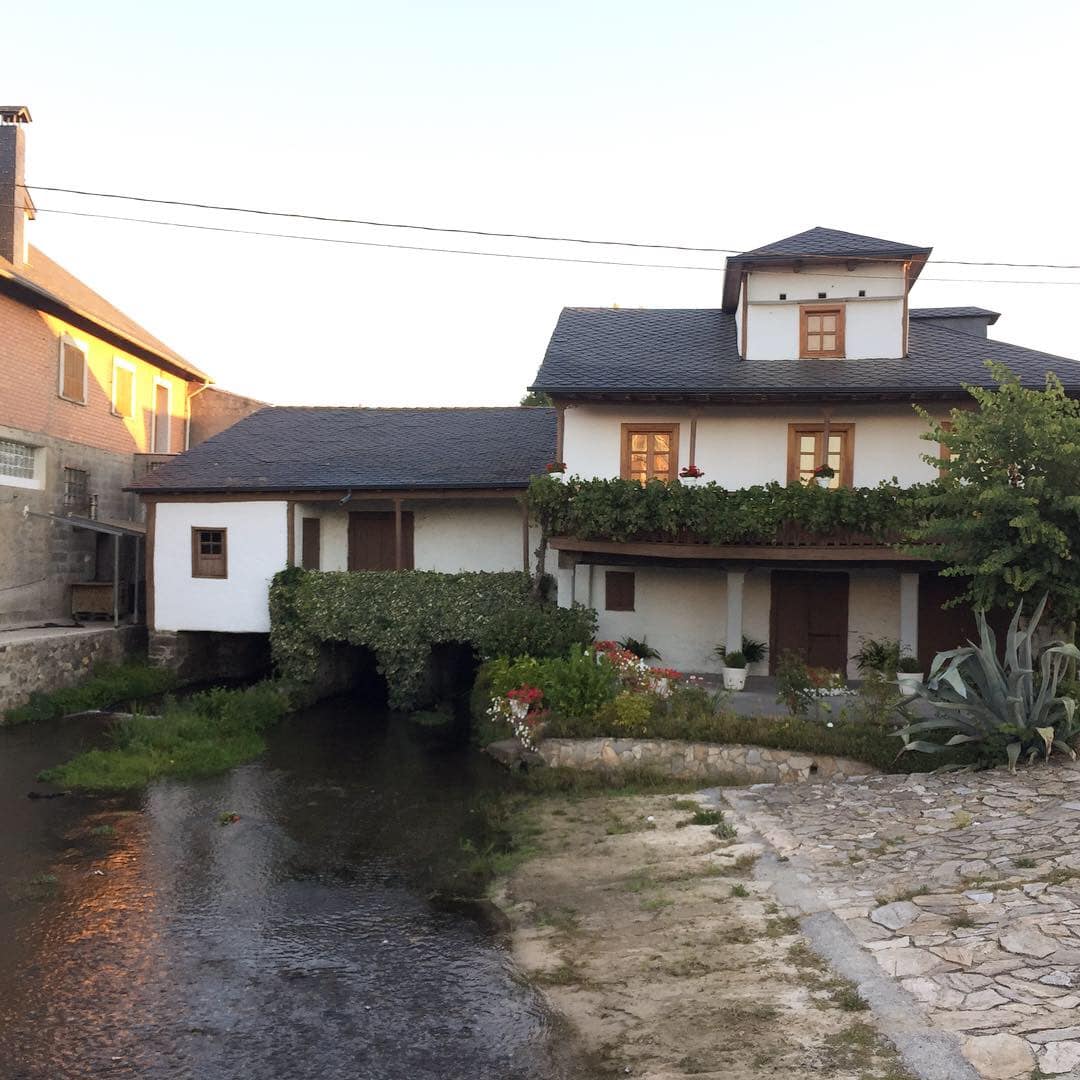 A cool house with a river running through it