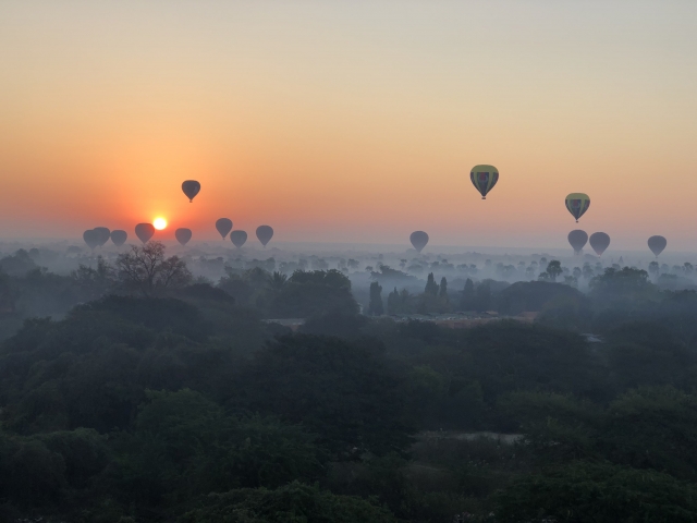 Sunrise with hot air balloons over Bagan
